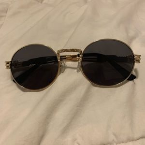 Gold rimmed round glasses